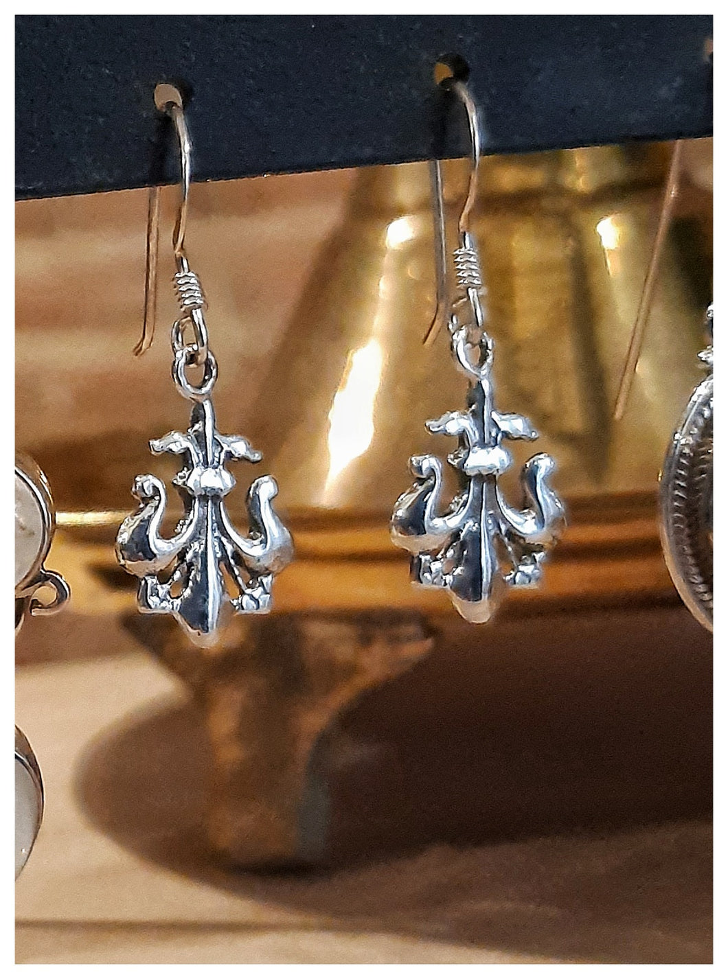 Boucles d'oreilles en argent Fleur de Lys stylisée