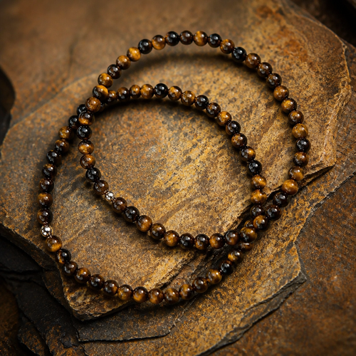 Bracelet fin en œil de tigre & petite boule d'argent 925