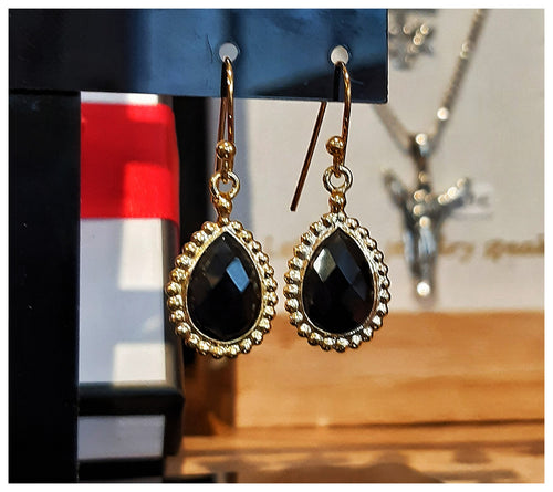 Boucles d'oreilles onyx noir taillé cerclé d'argent travaillé