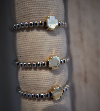 Bague en petites boules d'argent élastique - originale est très jolie!